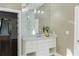 Modern bathroom vanity with marble countertop, elegant fixtures, and an oversized mirror at 3258 Bransley Way, Duluth, GA 30097