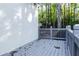 Cozy deck with gray wood and railing, overlooking the surrounding trees at 3258 Bransley Way, Duluth, GA 30097