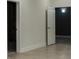 Hallway with neutral paint, white trim and doors leading to other rooms at 3258 Bransley Way, Duluth, GA 30097