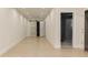 Hallway featuring herringbone floors, recessed lighting, and doorways to the bathroom and another room at 3258 Bransley Way, Duluth, GA 30097