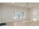 Bright living room with herringbone floors and natural light from the windows at 3258 Bransley Way, Duluth, GA 30097