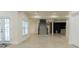 Open living area with a view of the staircase and tile flooring at 3258 Bransley Way, Duluth, GA 30097