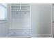 Well-organized mudroom with built-in storage and convenient coat hooks at 3258 Bransley Way, Duluth, GA 30097