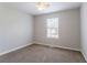 Bedroom featuring neutral carpet, natural lighting, and a ceiling fan at 3617 Summit Trce, Decatur, GA 30034