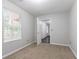 Cozy bedroom with carpet, natural light from window, and neutral wall paint at 3617 Summit Trce, Decatur, GA 30034