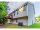 Rear exterior view with deck, vinyl siding, patio and HVAC unit at 3617 Summit Trce, Decatur, GA 30034