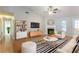 Cozy living room showcases hardwood floors, modern furniture, and a fireplace at 3617 Summit Trce, Decatur, GA 30034