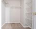 Functional walk-in closet with carpet and multiple tiers of wire shelving for optimal storage at 3617 Summit Trce, Decatur, GA 30034