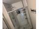 Modern shower with glass door, subway tile, and rainfall shower head providing a luxurious spa experience at 4678 Browns Mill Ferry Rd, Lithonia, GA 30038