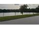 Enjoy community living with access to a pond, as seen in this serene neighborhood view at 4678 Browns Mill Ferry Rd, Lithonia, GA 30038