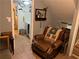 Hallway featuring seating, decorative mirror and doorway leading to another room at 3317 Shady Oak Dr, Atlanta, GA 30340