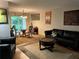 Comfortable living room with hardwood floors, a cozy rug, and elegant decor at 3317 Shady Oak Dr, Atlanta, GA 30340