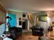 Cozy living room with hardwood floors, comfortable seating, and a blue front door at 3317 Shady Oak Dr, Atlanta, GA 30340
