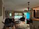 Inviting living room with a unique turquoise door and abundant natural light at 3317 Shady Oak Dr, Atlanta, GA 30340