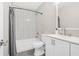 Modern bathroom with subway tile, a sleek vanity, and contemporary fixtures at 390 Lincoln Sw Pl, Atlanta, GA 30315