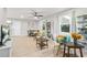 Bright living room with neutral decor, hardwood floors, and large windows offering abundant natural light at 390 Lincoln Sw Pl, Atlanta, GA 30315