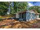 Charming single-story brick home with a welcoming front porch and landscaped yard at 4756 Fellsridge Dr, Stone Mountain, GA 30083