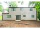 Exterior view of house with backyard with sliding door at 5092 Stone Trce, Stone Mountain, GA 30083