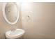 Bathroom features a modern sink and a decorative mirror at 5092 Stone Trce, Stone Mountain, GA 30083