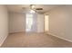 Spacious bedroom boasts plush carpeting and ample natural light at 5092 Stone Trce, Stone Mountain, GA 30083