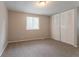 Neutral bedroom with carpeted flooring and large closet at 5092 Stone Trce, Stone Mountain, GA 30083