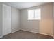 Bedroom with carpet, double door closet, and natural light from a window at 5092 Stone Trce, Stone Mountain, GA 30083