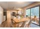 Inviting kitchen featuring stainless steel appliances, and breakfast table on patio at 5092 Stone Trce, Stone Mountain, GA 30083