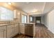 Modern kitchen with stainless steel appliances, granite countertops and luxury vinyl plank flooring at 5092 Stone Trce, Stone Mountain, GA 30083