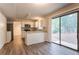 Modern kitchen with stainless steel appliances and breakfast bar at 5092 Stone Trce, Stone Mountain, GA 30083
