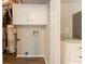 Laundry room with water heater, storage, and countertop at 5092 Stone Trce, Stone Mountain, GA 30083