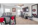 Inviting bedroom with carpet, fan, window, and large mirror, creating a comfortable and modern space at 5310 Chestnut Dr, Cumming, GA 30040