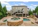 Beautiful backyard with inground pool, outdoor seating, spa and patio perfect for relaxing and entertaining at 103 Brightmoor Ct, Canton, GA 30115