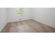 Neutral bedroom featuring carpet, fresh paint and natural light at 245 Amanda Ct, Stockbridge, GA 30281