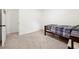 Bedroom features carpet, fresh paint, natural light, a bed and a door to another room at 245 Amanda Ct, Stockbridge, GA 30281