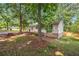 Cozy home with a picnic table on a nicely landscaped, tree-shaded lot at 245 Amanda Ct, Stockbridge, GA 30281