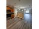 Open-concept kitchen and living space with stainless steel appliances at 2612 Haligan Pt, Riverdale, GA 30296
