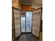 Inside a stainless steel refrigerator showcasing its storage capacity and features at 2612 Haligan Pt, Riverdale, GA 30296