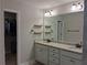 Bright bathroom with double sink vanity and walk-in closet, offering ample storage at 2647 Old Snapping Shoals Rd, Mcdonough, GA 30252