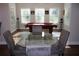 Bright game room includes pool table and seating area with abundant natural light at 2647 Old Snapping Shoals Rd, Mcdonough, GA 30252