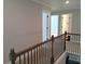 Second story hallway leading to the bathroom and bedroom at 2647 Old Snapping Shoals Rd, Mcdonough, GA 30252