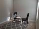 Cozy sitting area with natural light and a patterned rug at 2647 Old Snapping Shoals Rd, Mcdonough, GA 30252