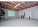 Spacious unfinished basement with natural light, perfect for customization at 7037 Tara Dr, Villa Rica, GA 30180