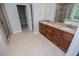 Primary bathroom featuring a large vanity and granite countertops at 7037 Tara Dr, Villa Rica, GA 30180