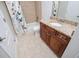 Full bathroom featuring granite vanity and tile flooring at 7037 Tara Dr, Villa Rica, GA 30180