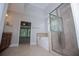 Well-lit bathroom with granite vanity, bathtub, and glass shower at 7037 Tara Dr, Villa Rica, GA 30180