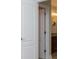 Bathroom doorway showcasing vanity and lighting at 7037 Tara Dr, Villa Rica, GA 30180
