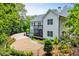 Exterior view of the home with decks and landscaping at 7037 Tara Dr, Villa Rica, GA 30180