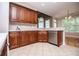 Modern kitchen with stainless steel appliances, elegant countertops, and ample storage at 7037 Tara Dr, Villa Rica, GA 30180