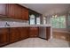 Modern kitchen with stainless steel appliances, elegant countertops, and ample storage at 7037 Tara Dr, Villa Rica, GA 30180