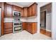 Well-equipped kitchen featuring modern appliances, tile backsplash, and ample cabinet space at 7037 Tara Dr, Villa Rica, GA 30180